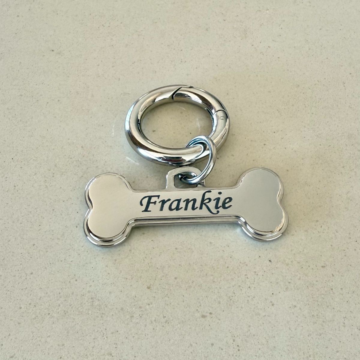pets name frankie engraved on bone id tag