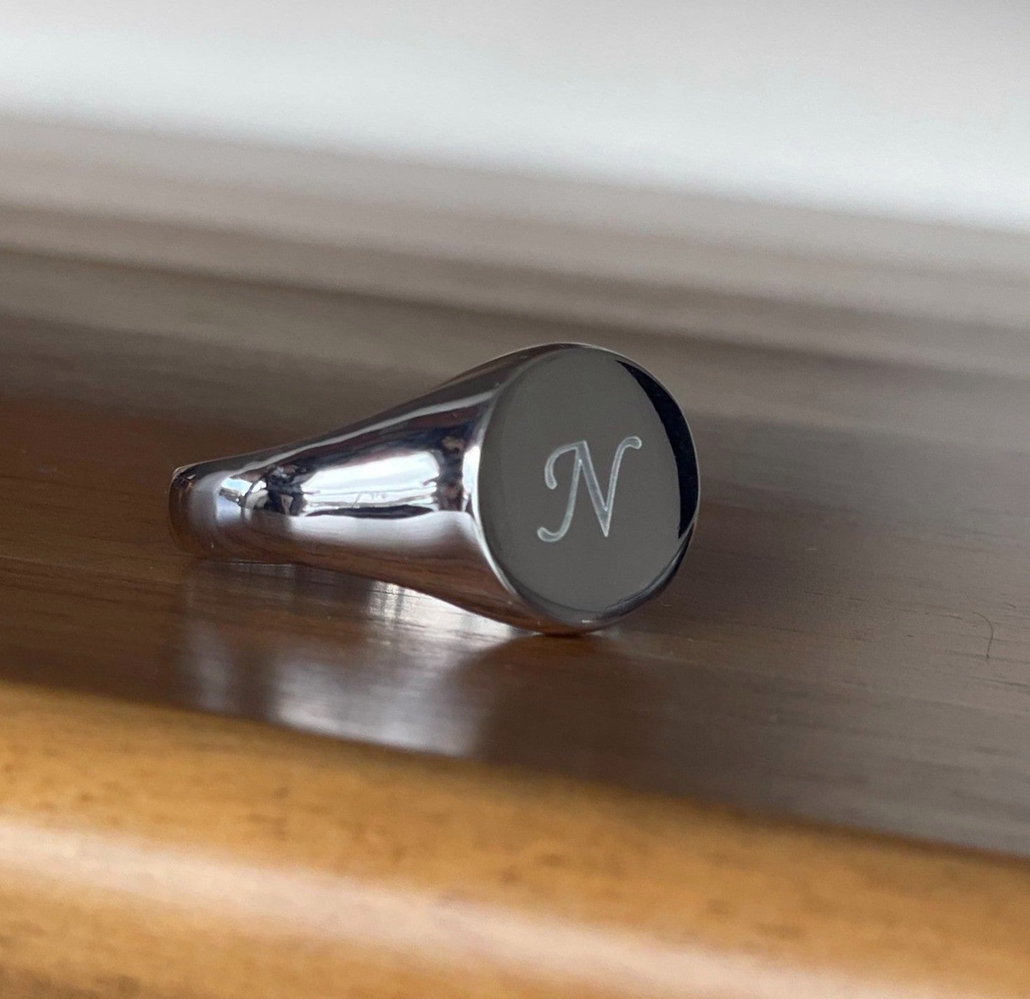 letter N engraved onto sterling silver signet ring