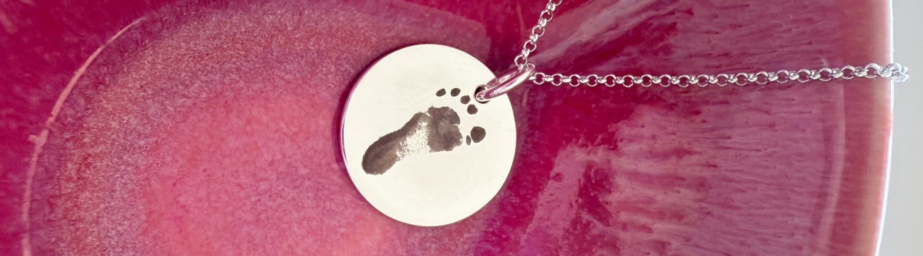 Personalised and engraved jewellery collection at The Silver Store featuring custom gifts and keepsakes.