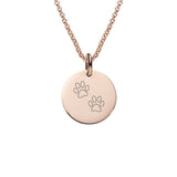 Rose gold disc necklace with paw print symbol engraved