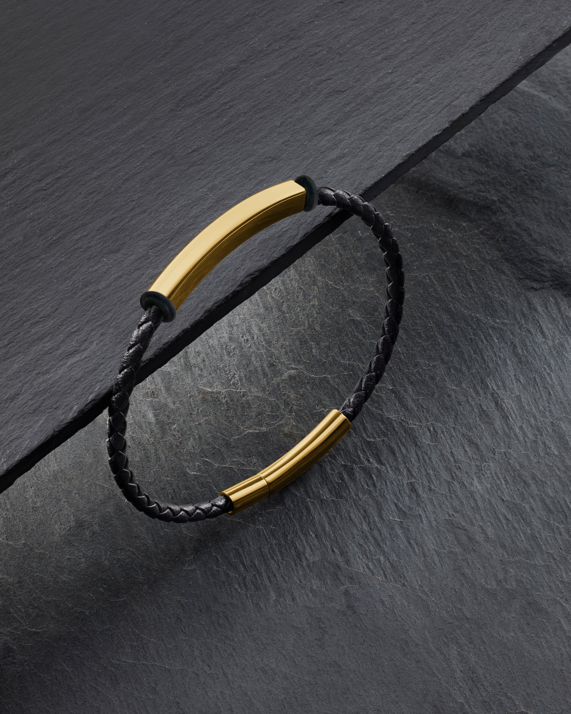 Engrave a name or date on this  Woven Leather Bracelet — Gold Steel Edition