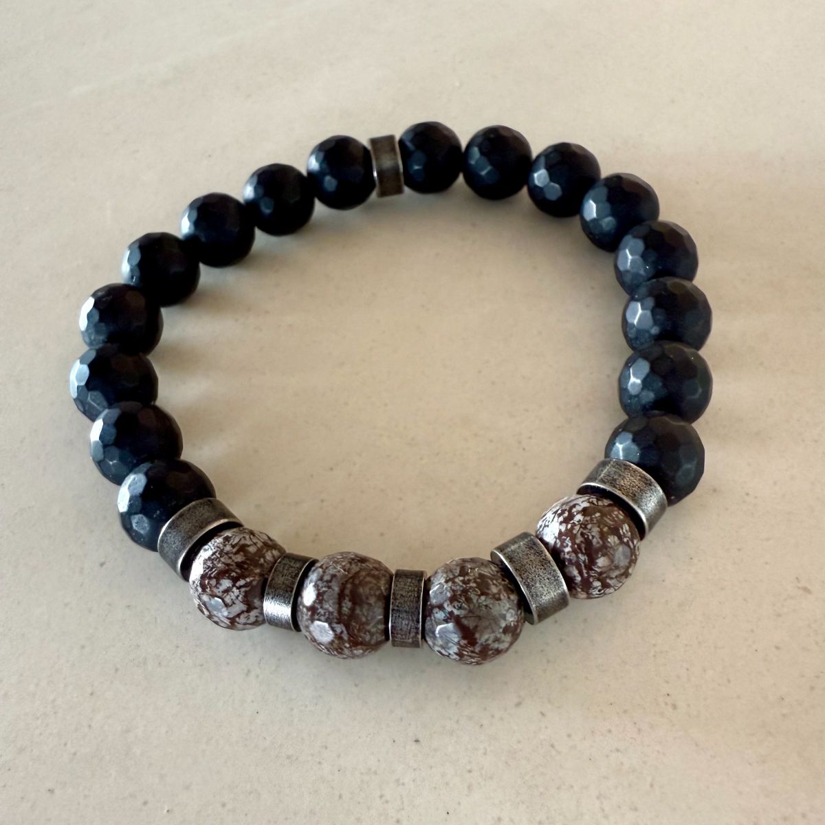 mens stretch black beaded bracelet with silver and brown accents 