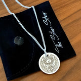 mens disc necklace engraved with phoenix design
