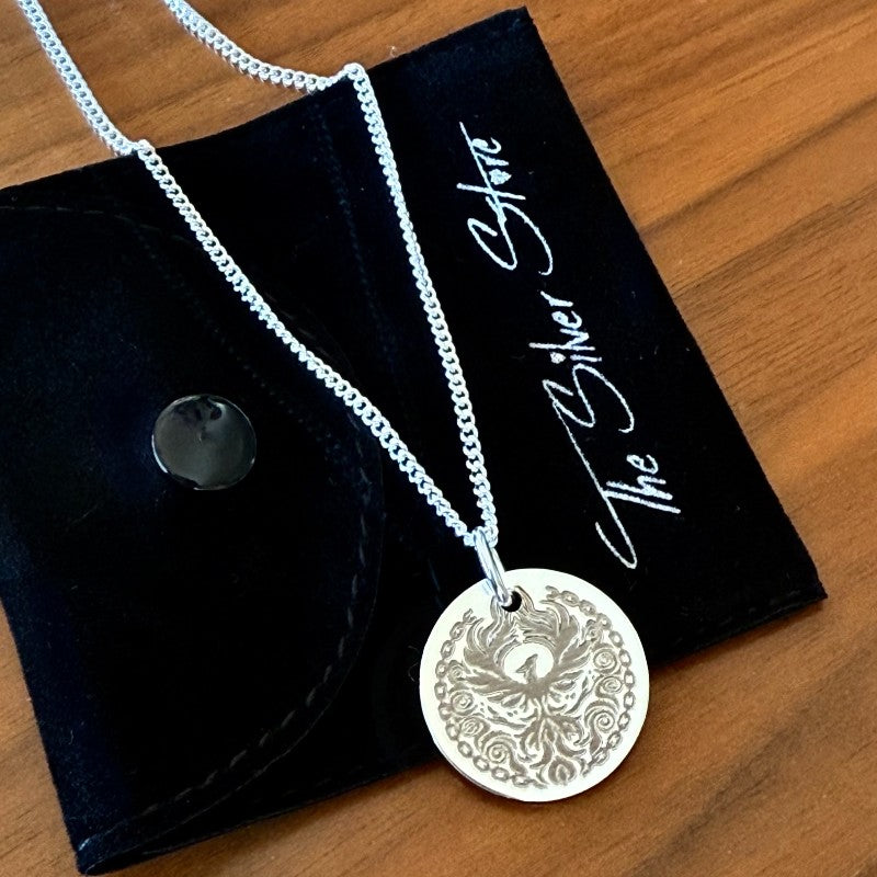 mens disc necklace engraved with phoenix design