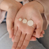 Silver disc pendants