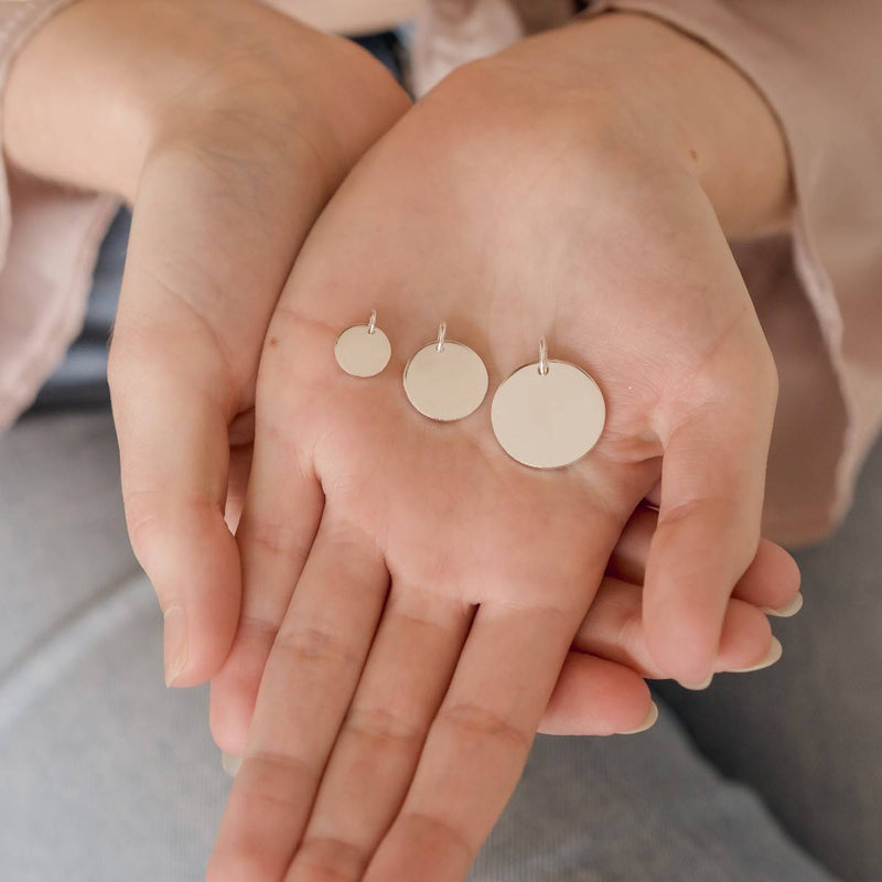 Silver disc pendants