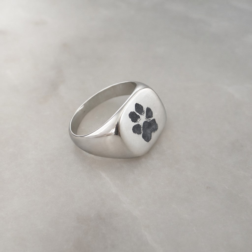 mens sterling silver cushion square with rounded corners signet ring engraved with paw print