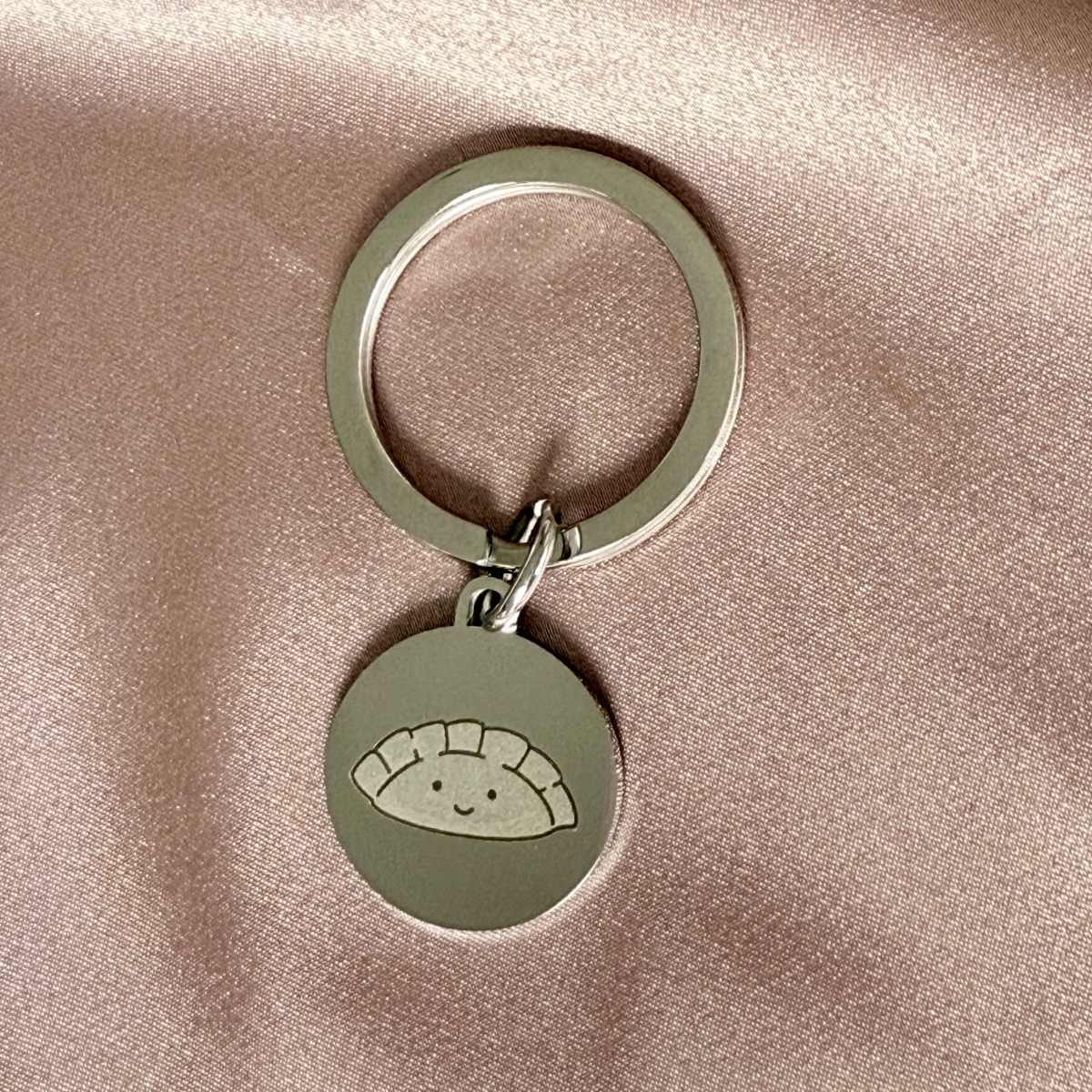 custom engraved keyring with dumpling image engraved 