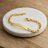 engraved gold steel figaro id bracelet