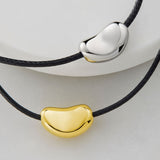 gold and silver bean necklace