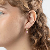 gold huggie earrings with ruby cz drop