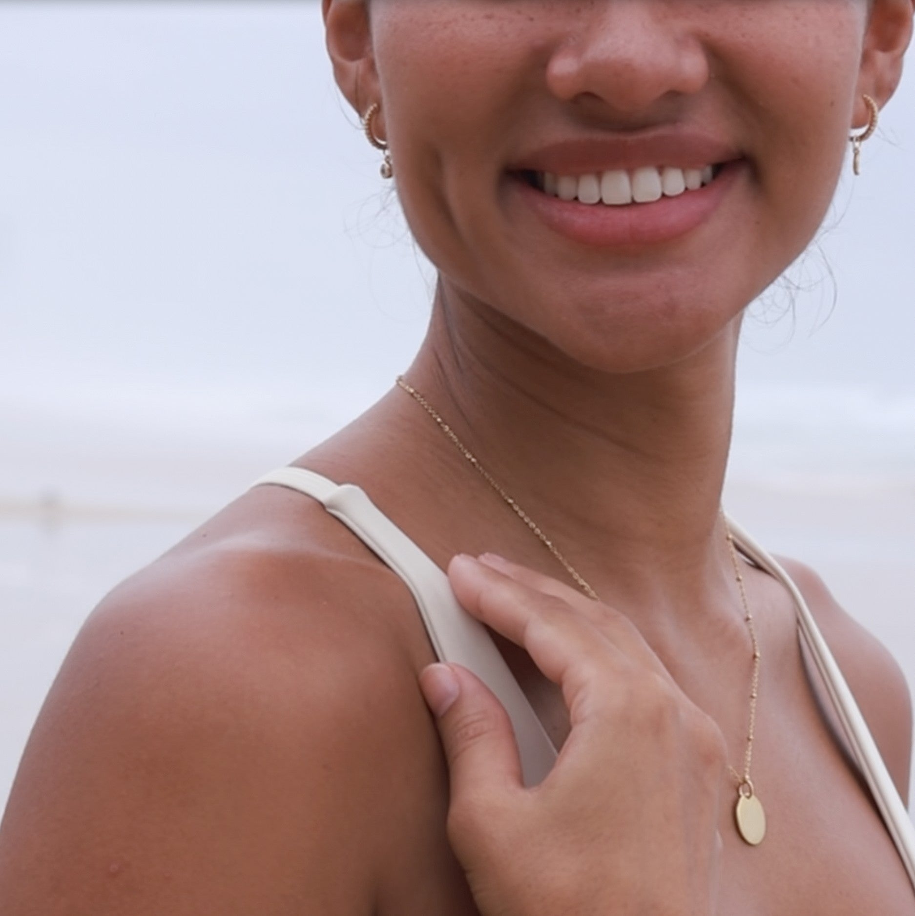 gold disc necklace with satellite chain