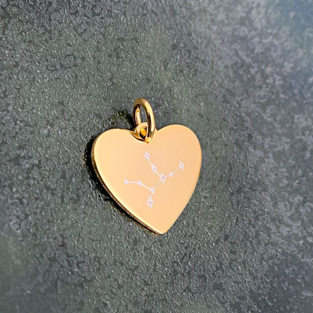 heart pendant engraved with star sign constellation