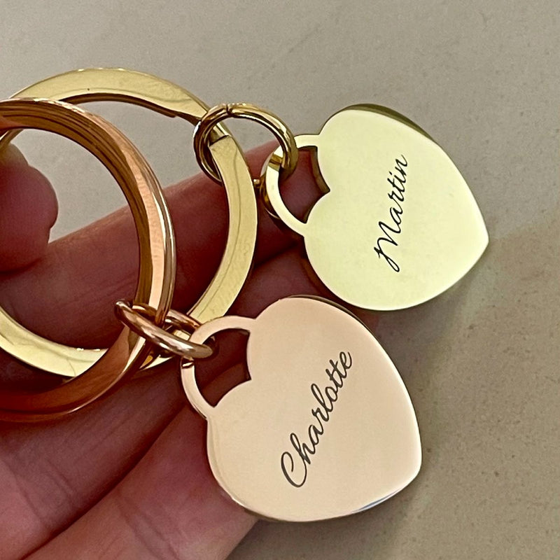 gold and rose gold heart keyrings engraved with names