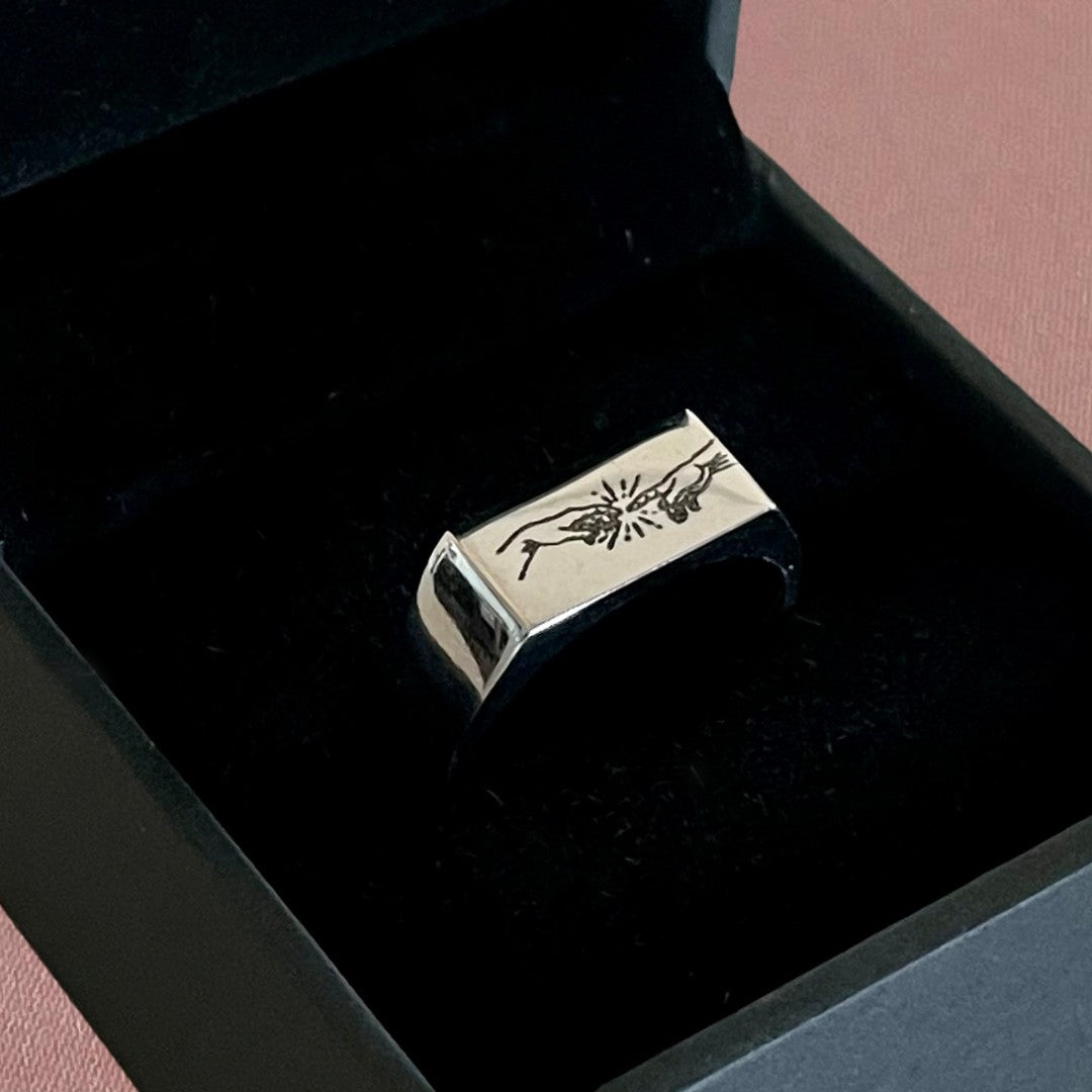 mens signet ring engraved with creation