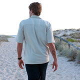 Stylish men’s black leather bracelets stacked on wrist, with brushed silver clasp – perfect personalised gift