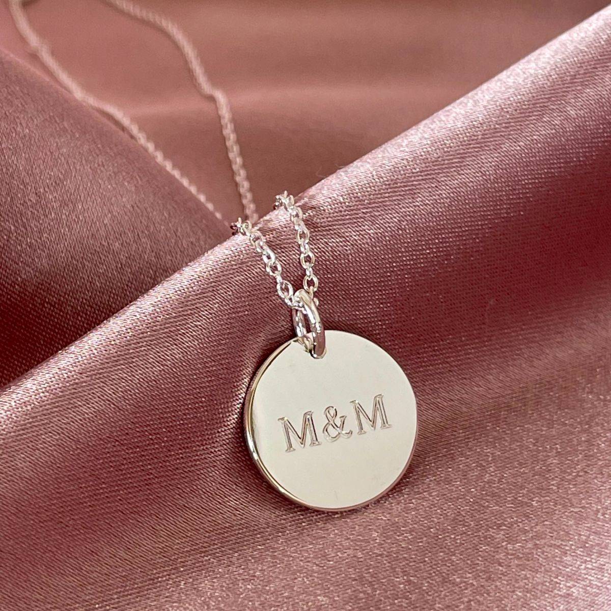 mini disc necklace with M & M engraved