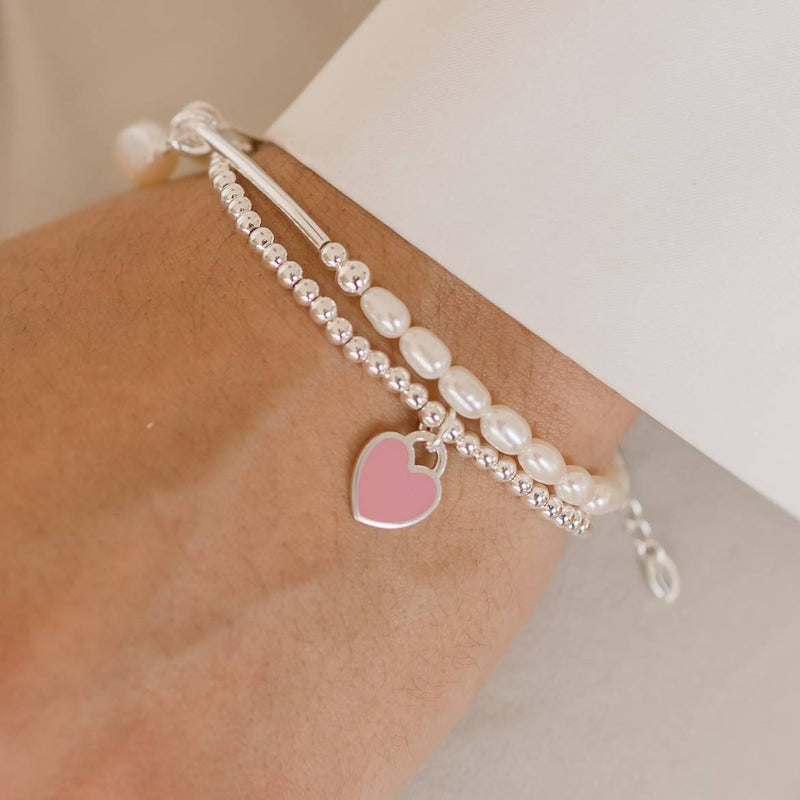 pearl bracelet and stretch silver bracelet