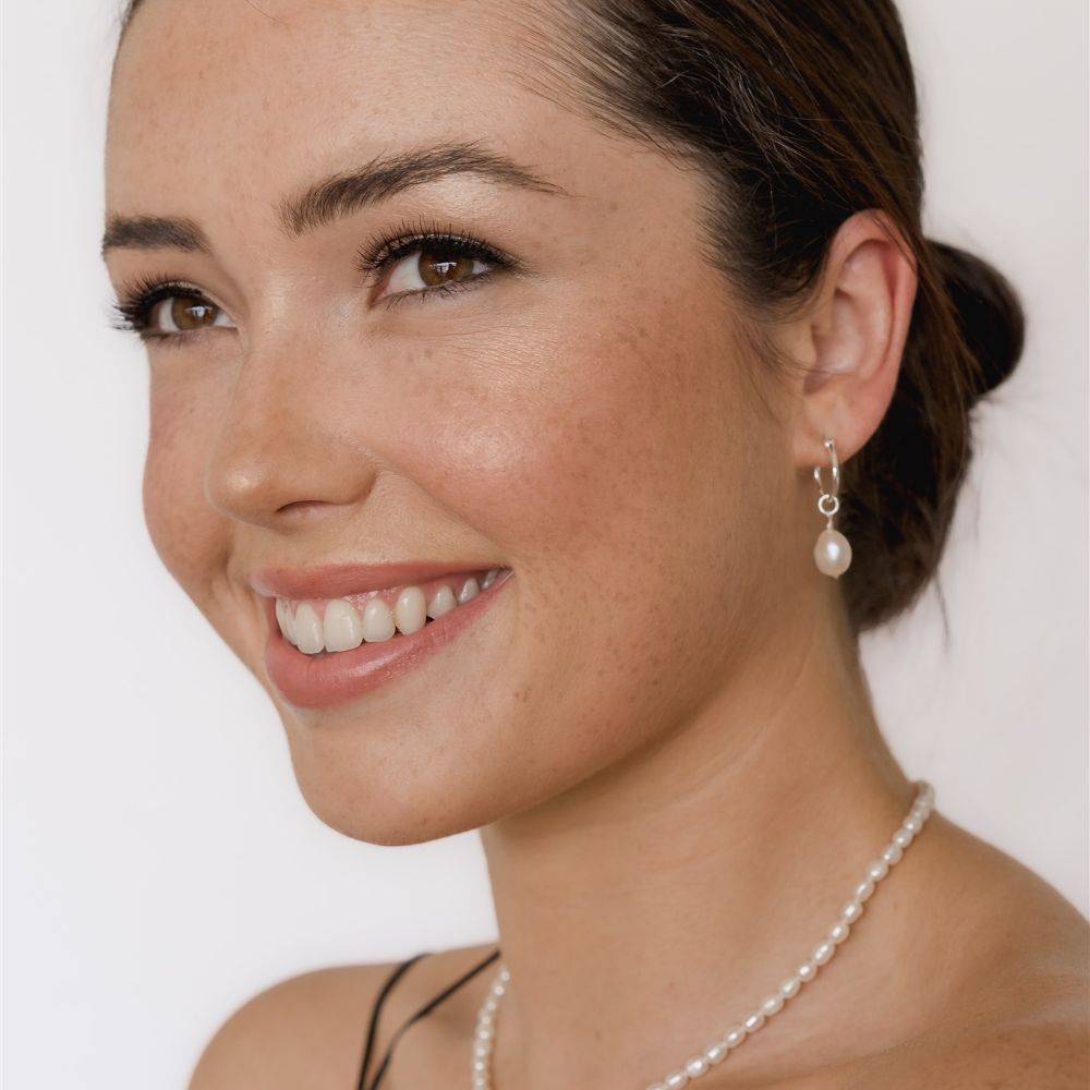 pearl necklace and pearl drop earrings