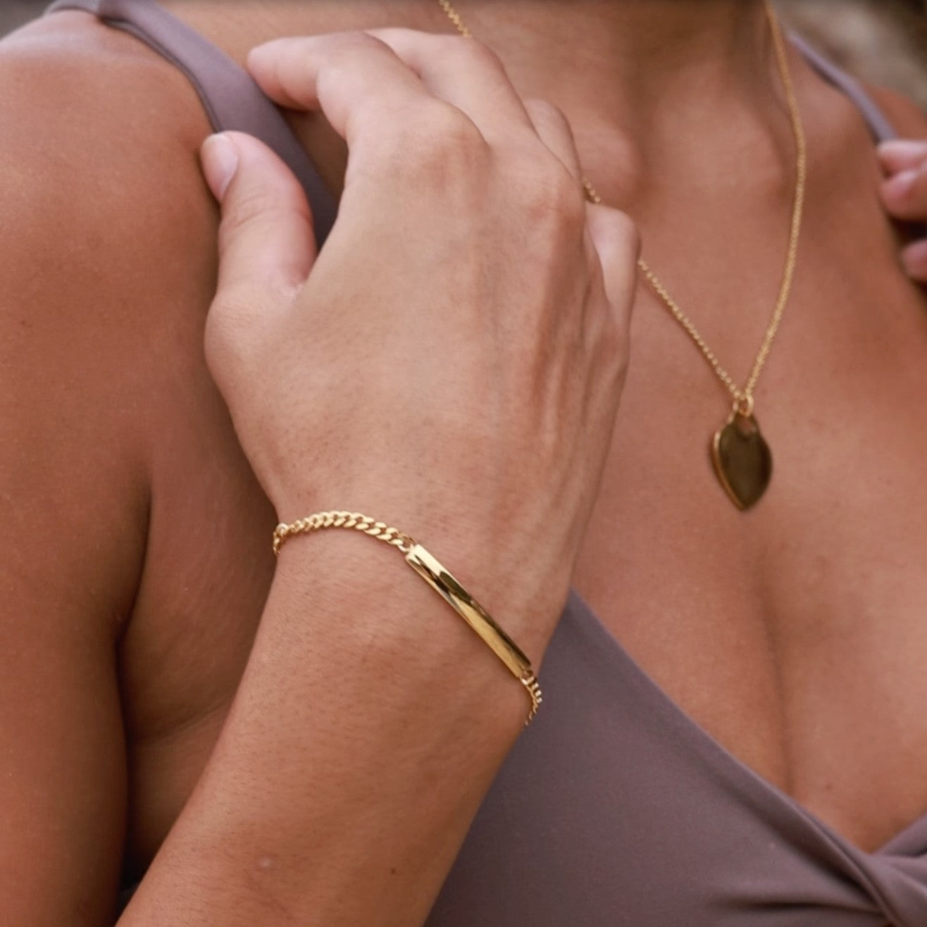 personalised gold bar bracelet , add engraving to front and or back of the bar.