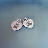 pet paw print and nose print engraved on silver heart tag pendant
