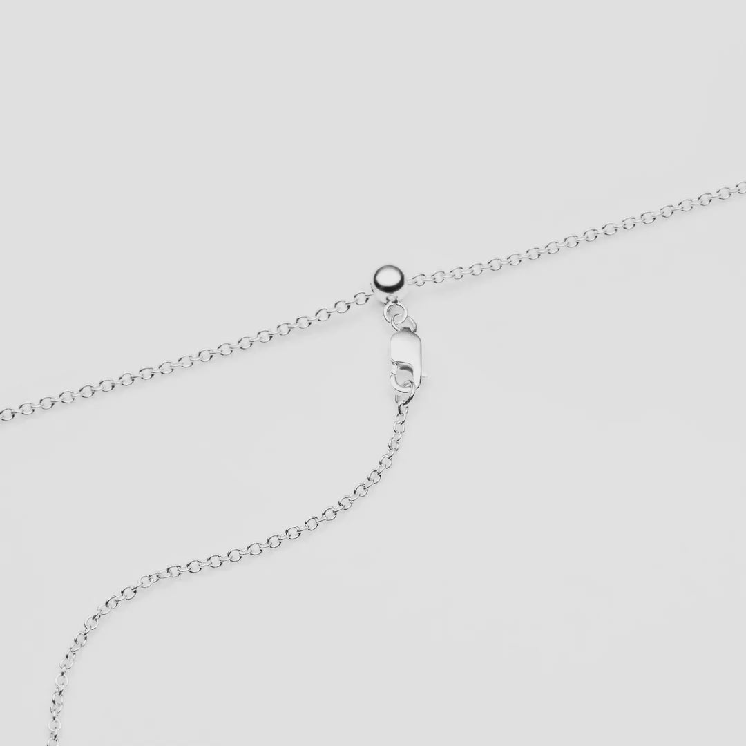 adjustable chain can change length by sliding through the bead