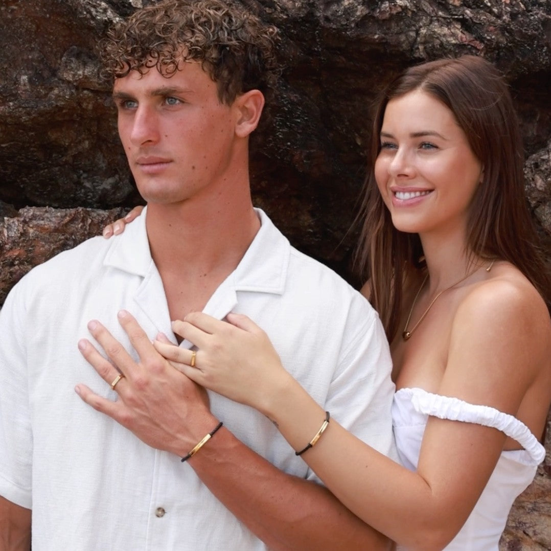 engraved couples leather id braclets and slim signet rings 