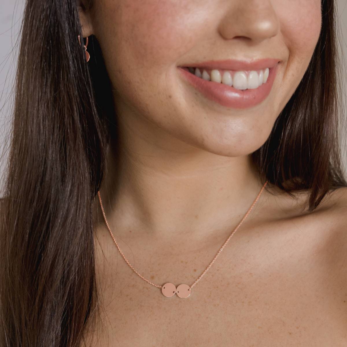 rose gold double disc necklace and disc earrings