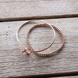 rose gold opening bangle and stretch bead bracelet