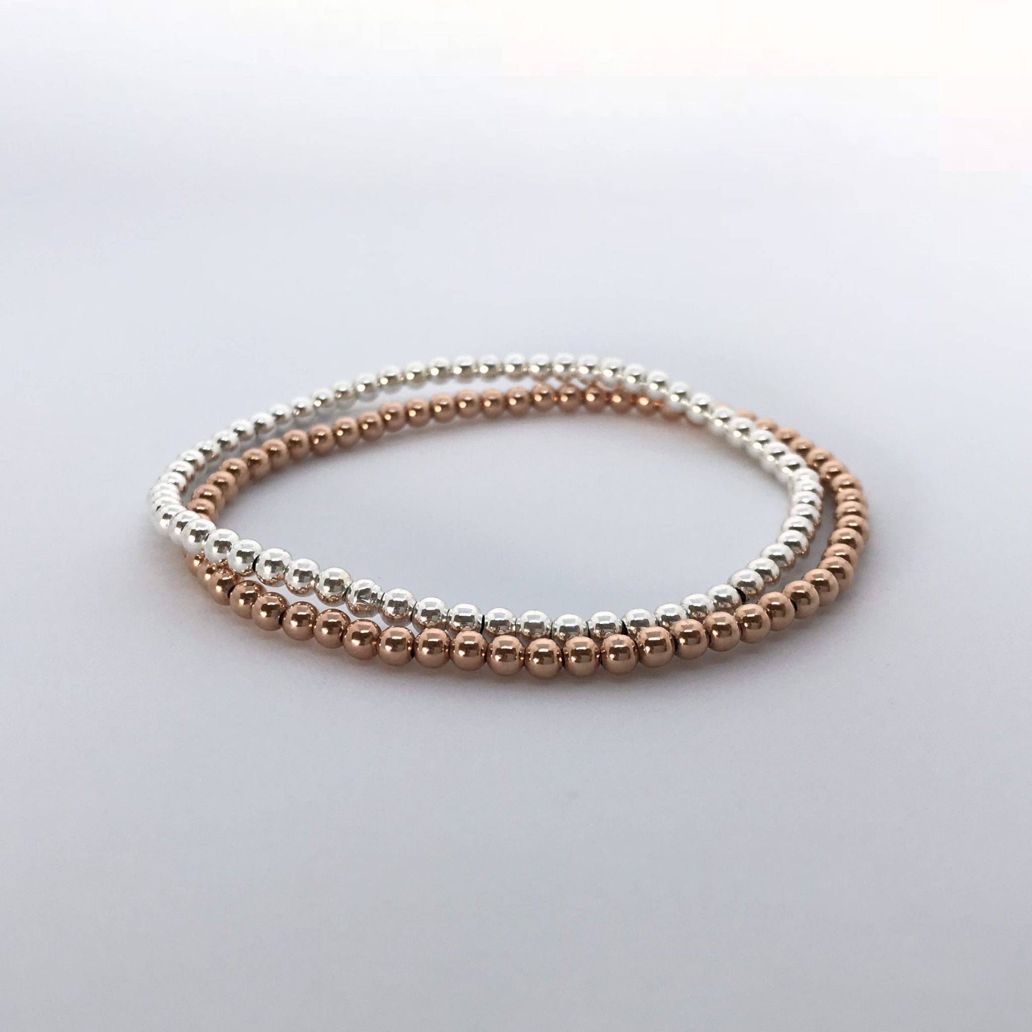silver and rose gold stretch bead bracelet