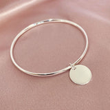sterling silver engraved disc bangle