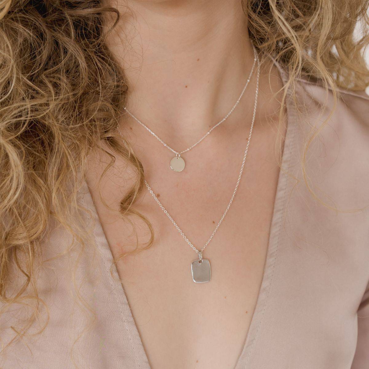 silver mini disc necklace + silver square necklace