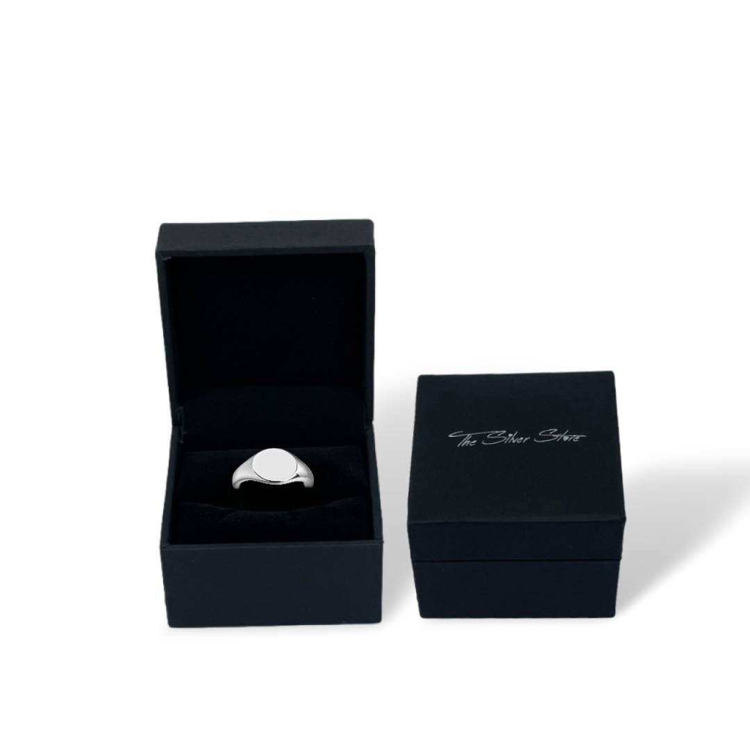 silver signet ring in gift box