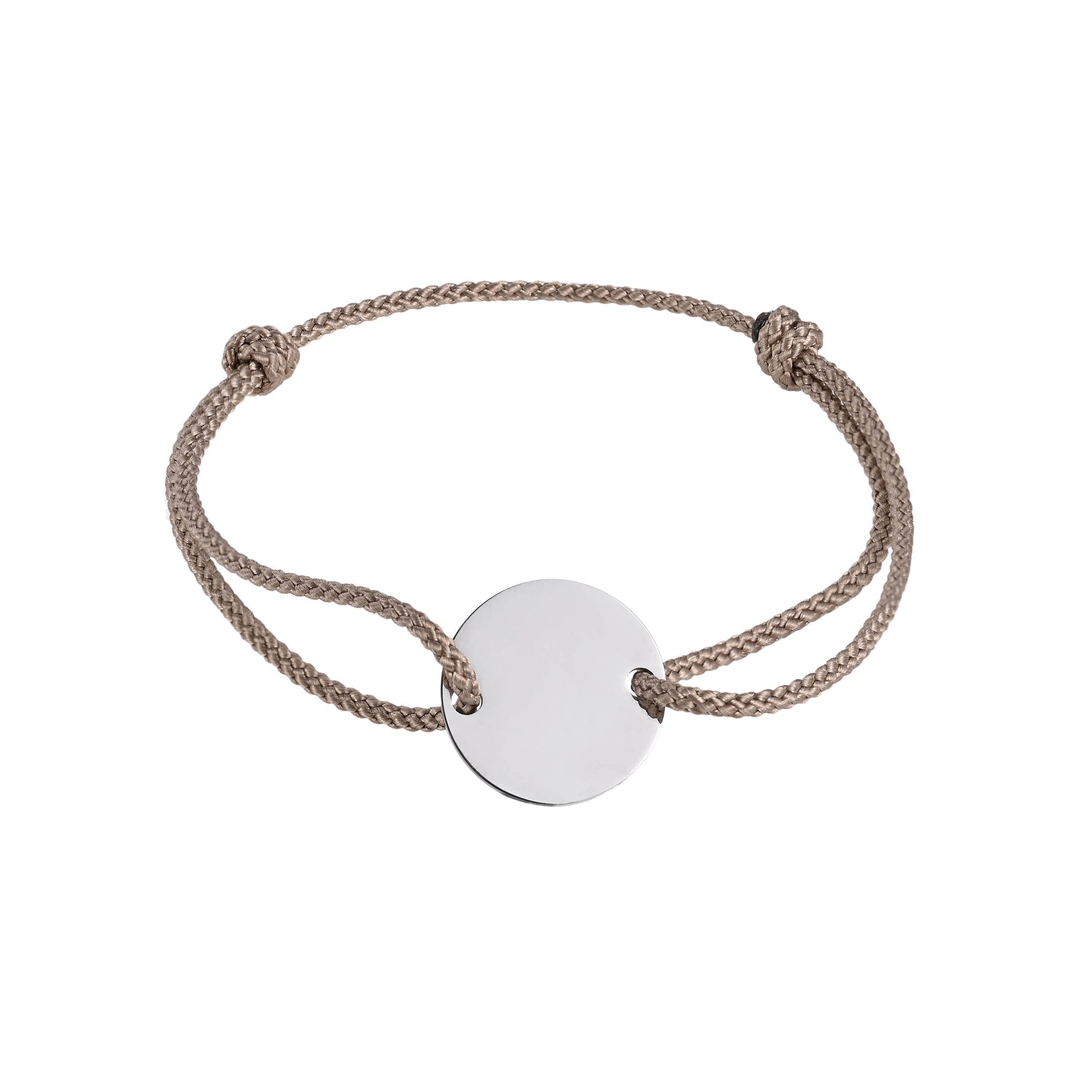 Bracelet with a round disc pendant on a beige cord against a white background