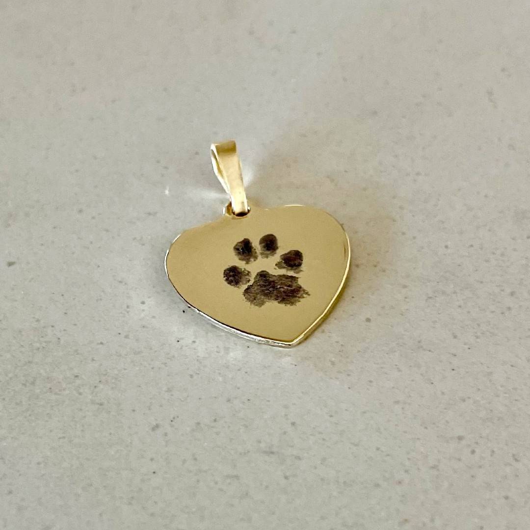 solid gold heart pendant with paw print engraved