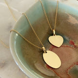 9ct solid gold oval pendant and heart pendant can be engraved