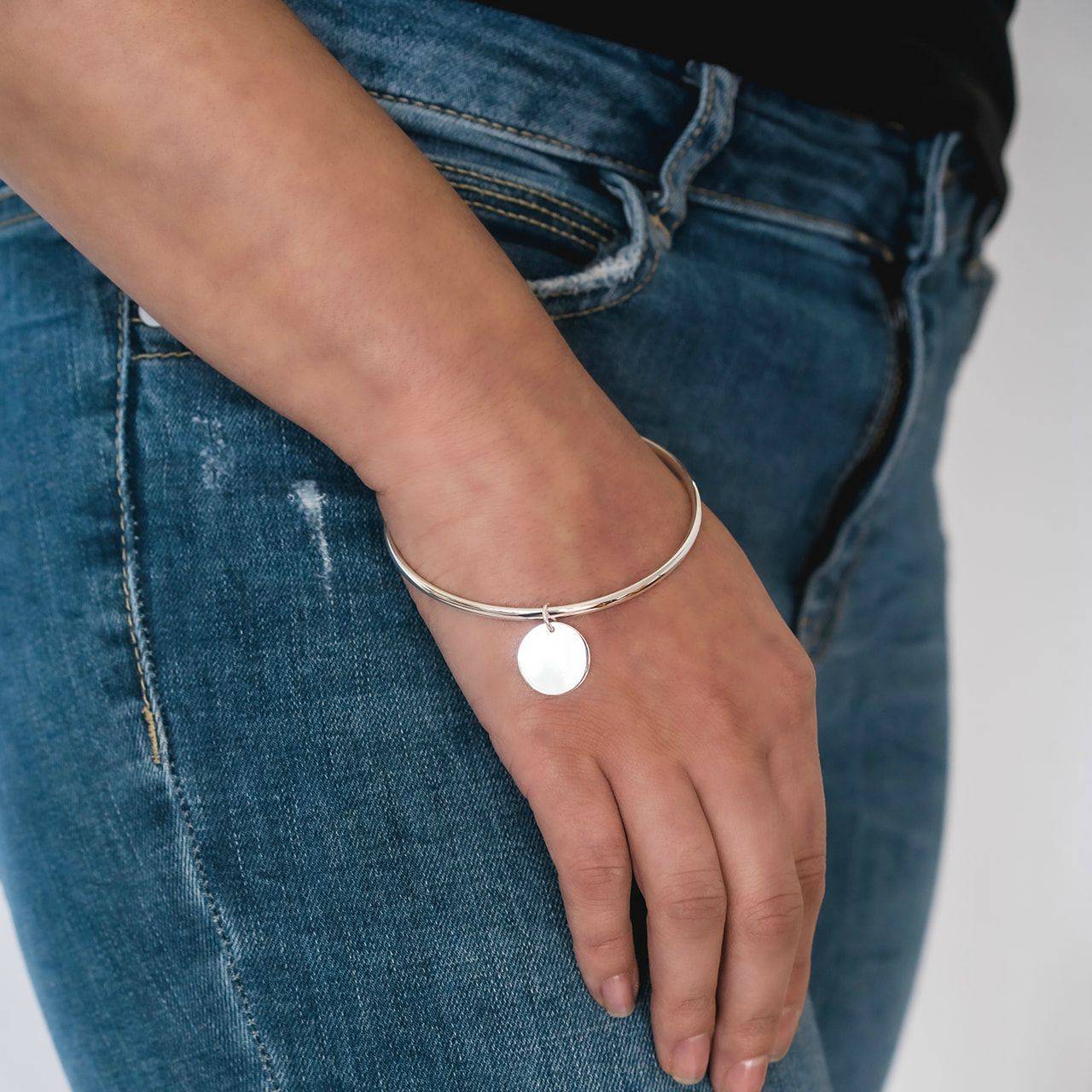 Personalise the disc on this sterling silver bangle