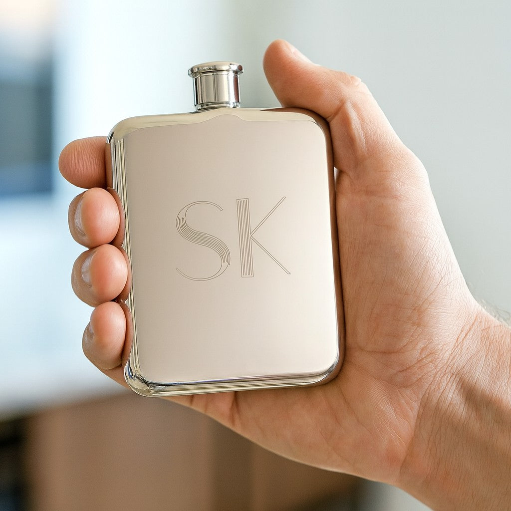 silver hip flask with SK initials engraved 