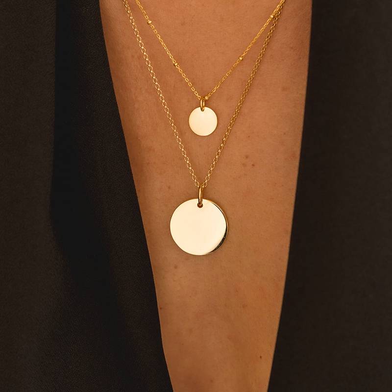 yellow gold large and mini disc necklaces