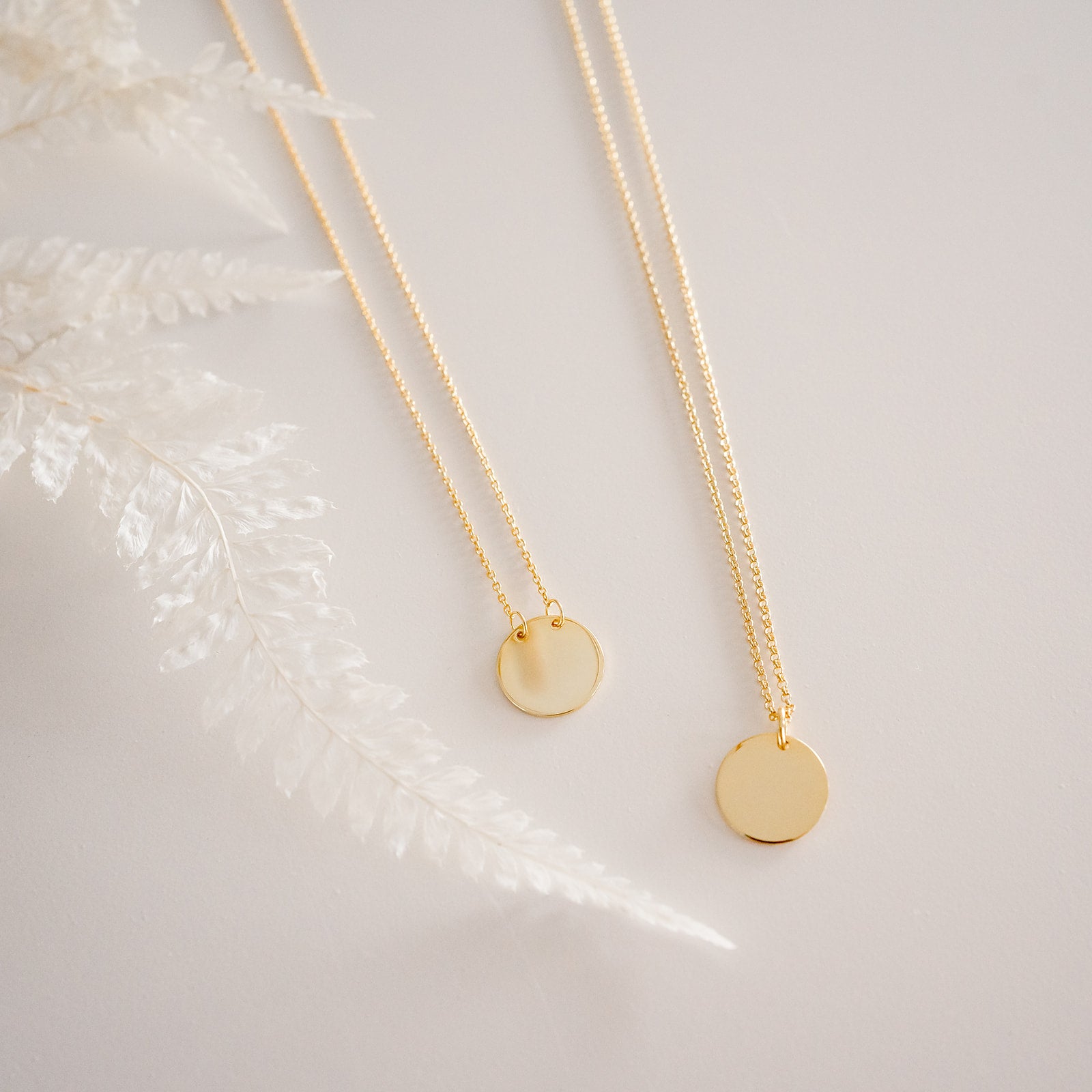 Gold disc necklace and suspended disc necklace