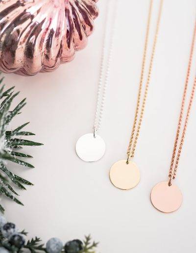 silver, gold and rose gold disc necklace with letter engraved