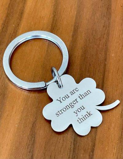 clover keyring engraved with you are stronger than they think