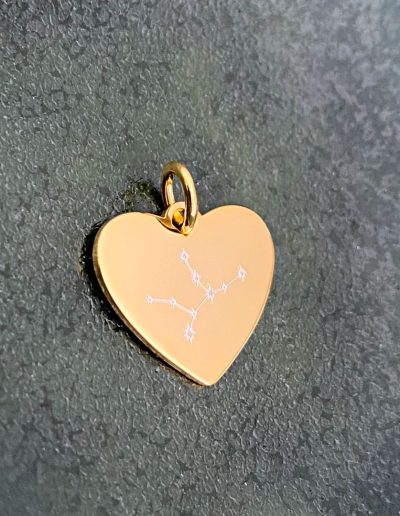 heart pendant engraved with star sign constellation
