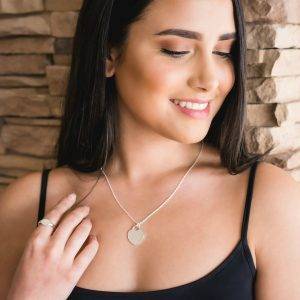 large heart tag necklace and signet ring