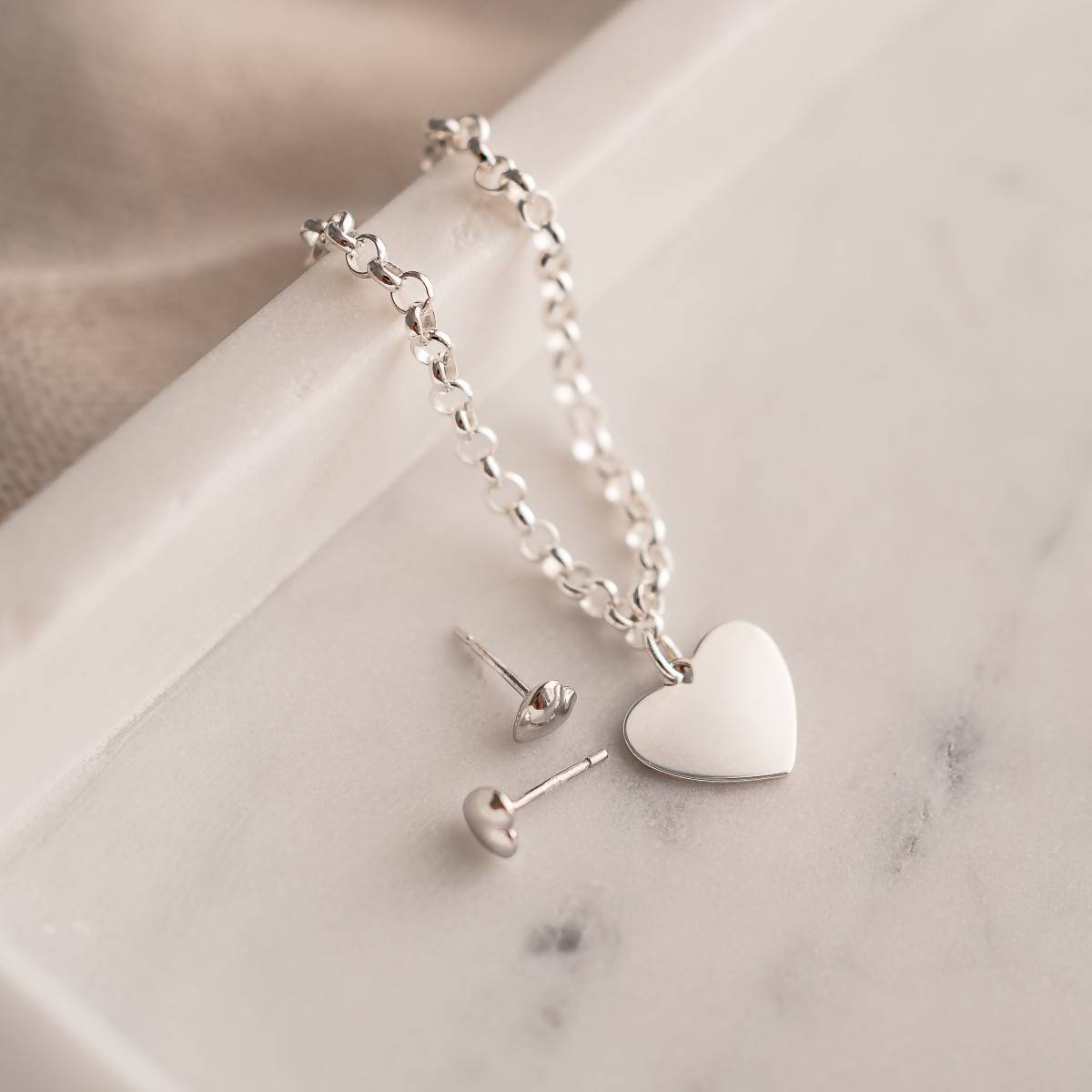 engraved heart bracelet and heart earrings