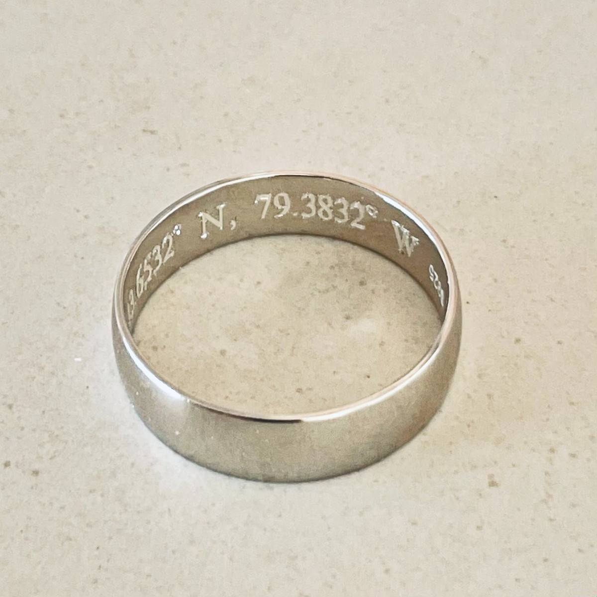 mens sterling silver ring engraved with coordinates inside