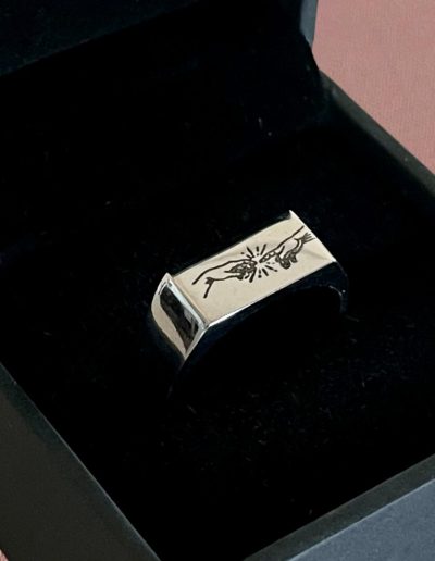 mens signet ring engraved with creation
