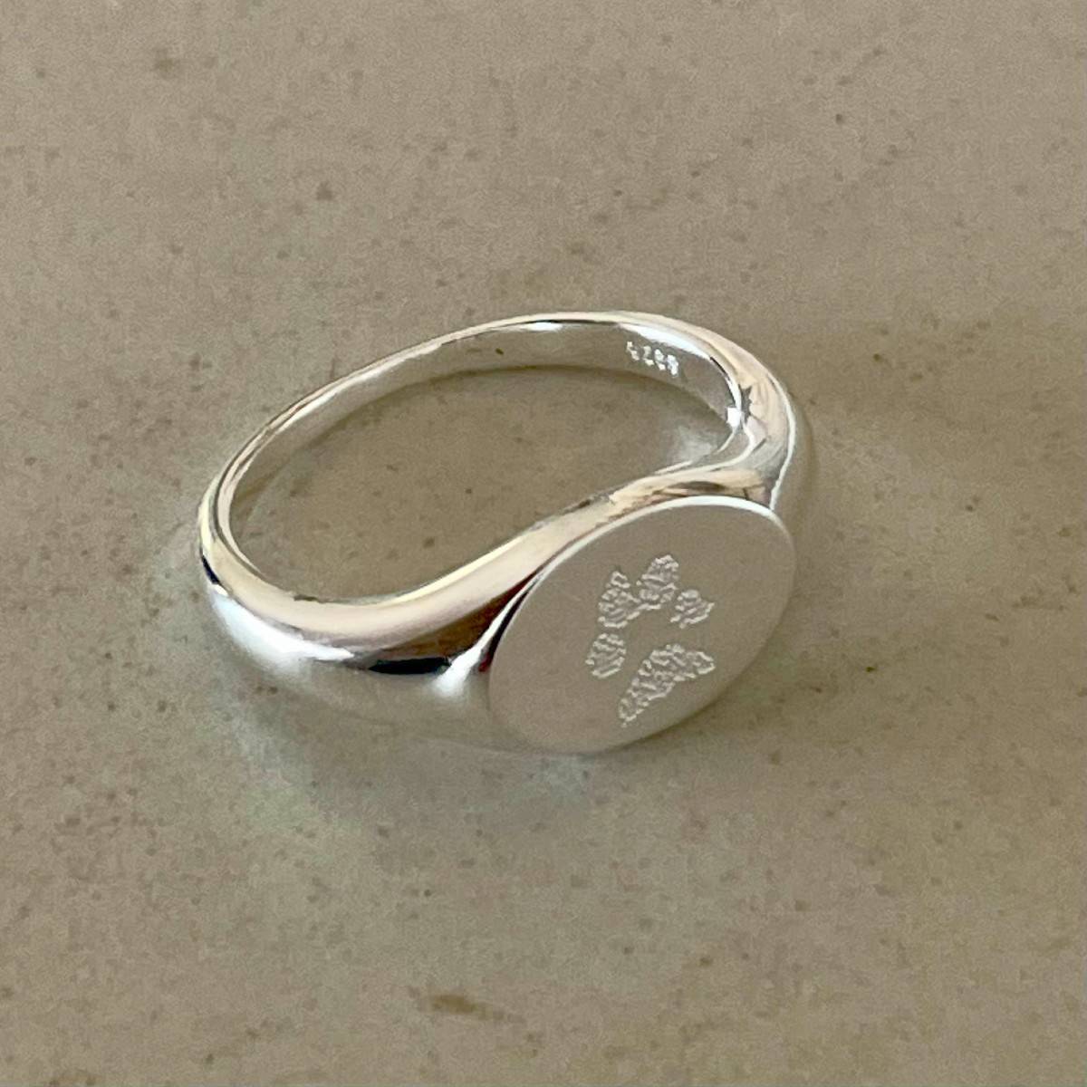 signet ring with paw print engraved