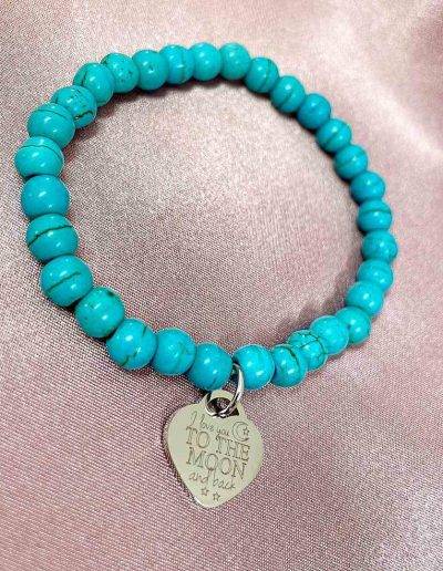 turquoise stretch bead bracelet with engraved heart pendant