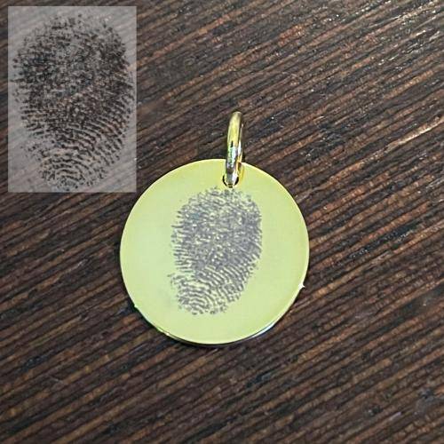 fingerprint engraved on gold disc pendant